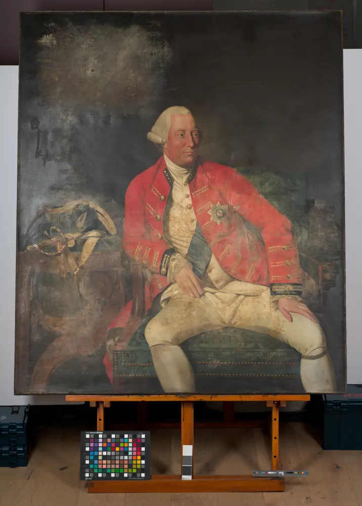 A historic painted portrait on an easel in the Endangered Heritage studio